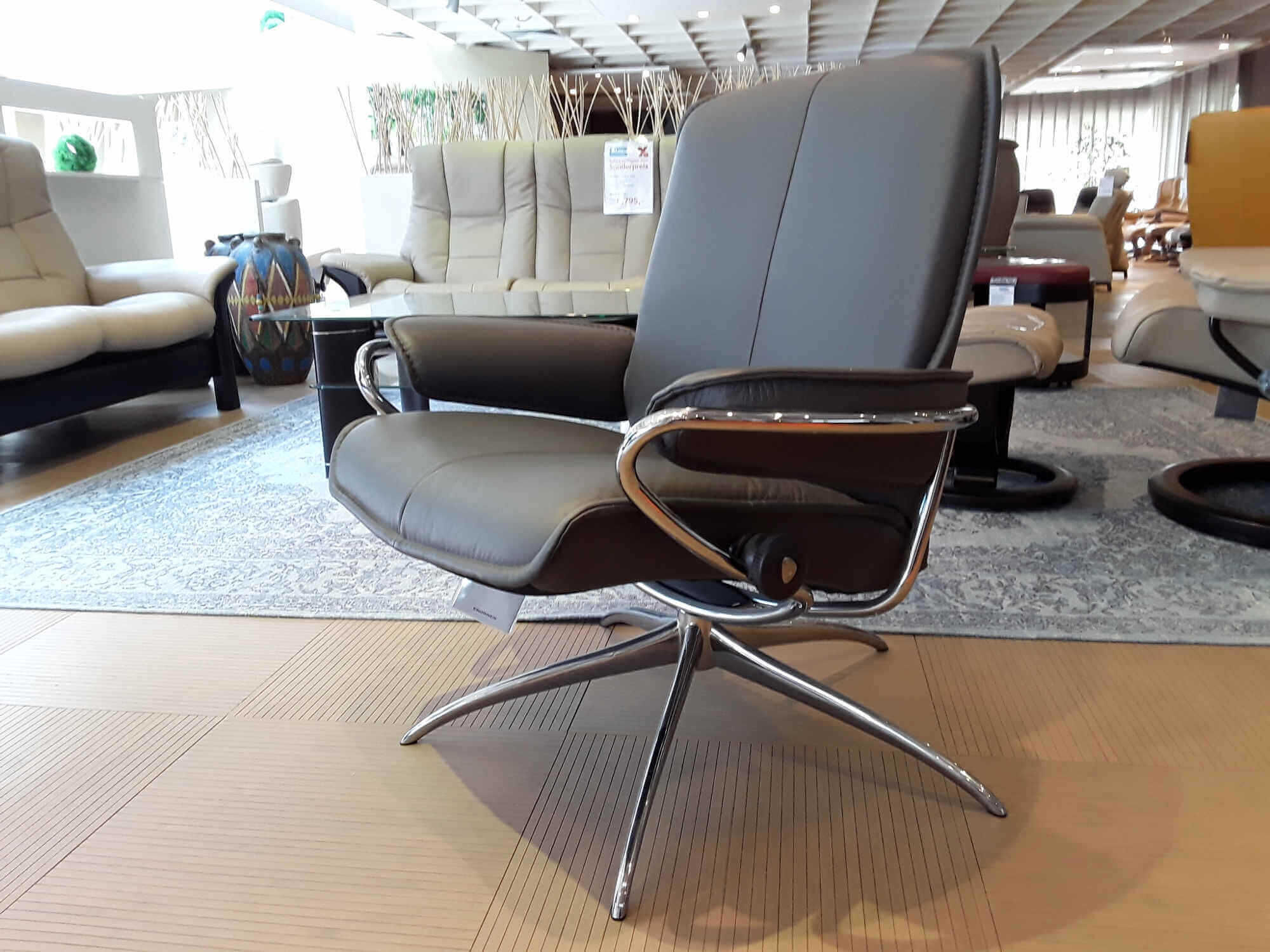 Stressless - Sessel City Low Back Leder Grau Star Base mit Hocker - 2