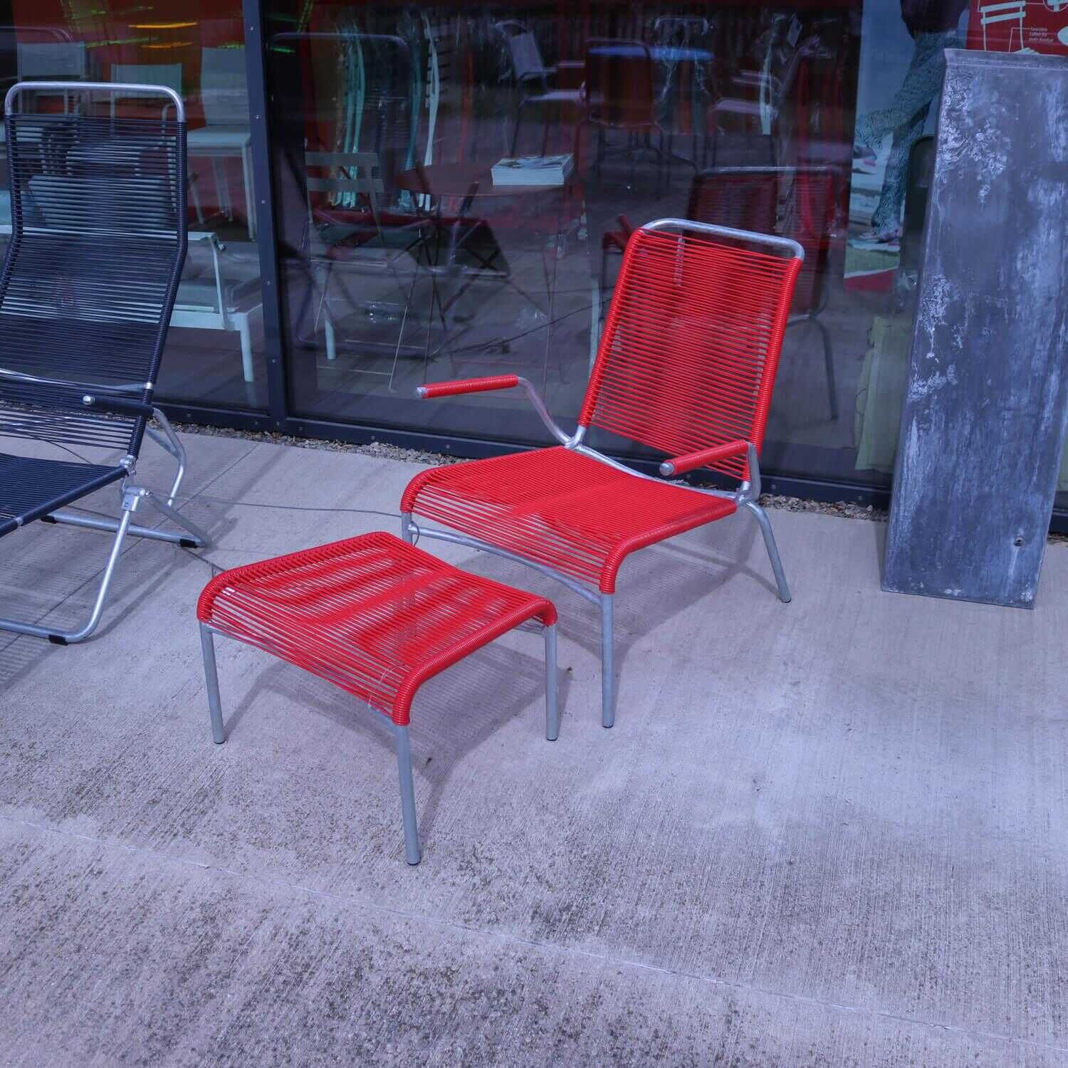 Loungesessel Outdoor Bespannung PVC Kordel Rot Gestell Stahlrohr mit Hocker