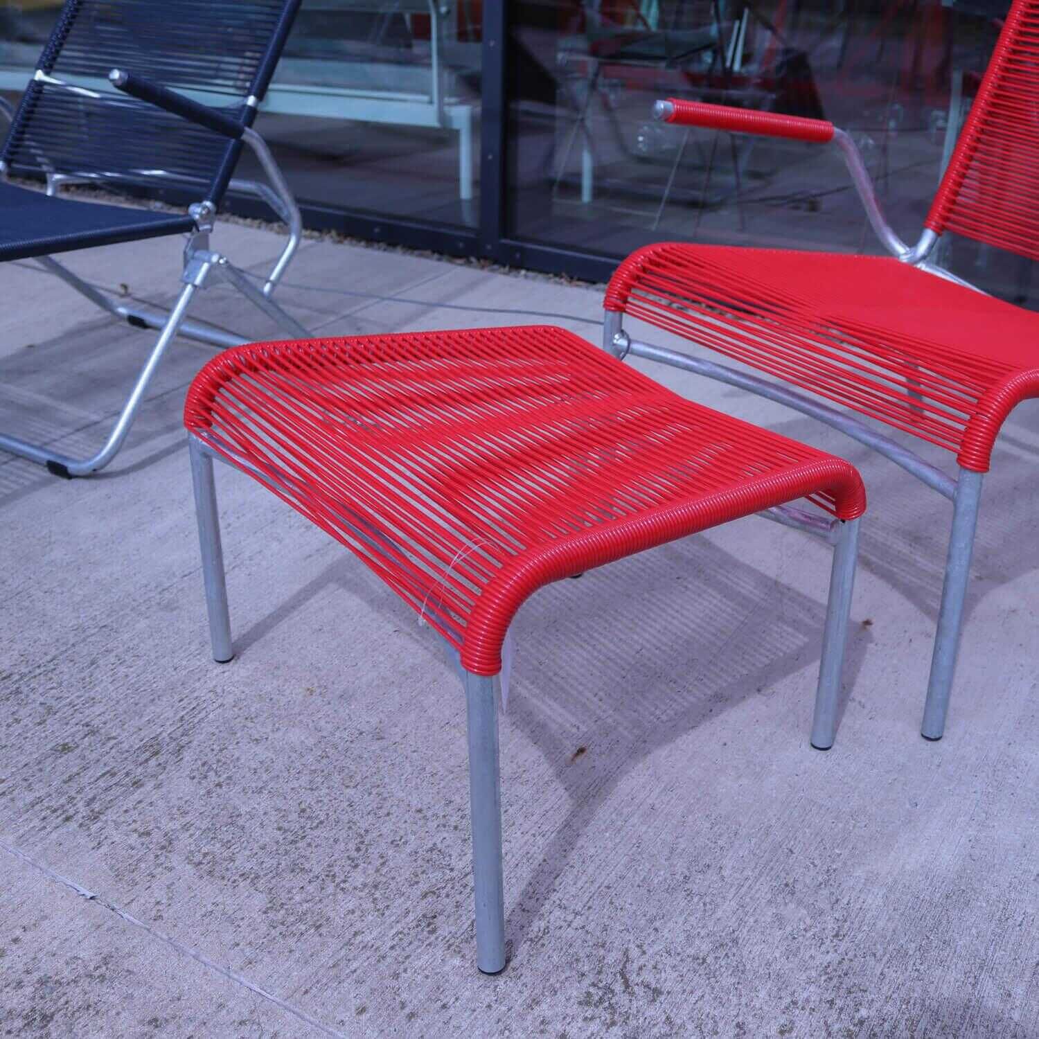 Loungesessel Outdoor Bespannung PVC Kordel Rot Gestell Stahlrohr mit Hocker