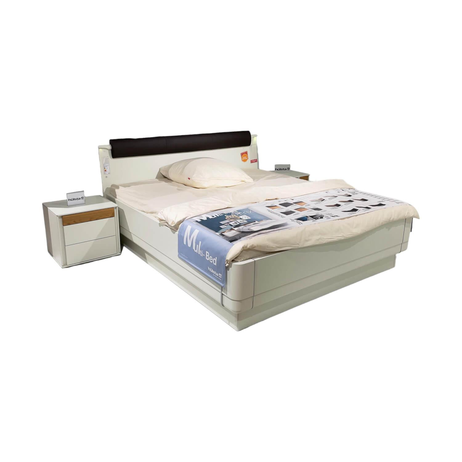 Doppelbett Multi Bed 4271 Lack Weiß Aufsatzpolster Leder 5126 Mocca Braun Mit Konsolen Und Beleuchtung Ohne Mattratze Und Lattenrost