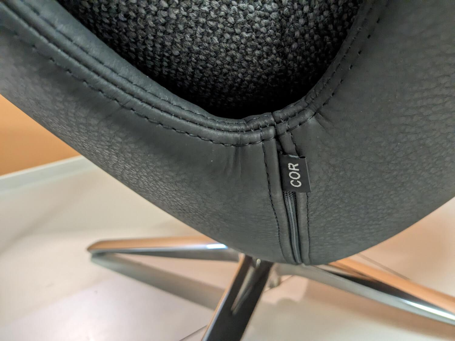 Sessel Cordia Lounge Stoff Grau Leder Schwarz Füße Poliert mit Hocker